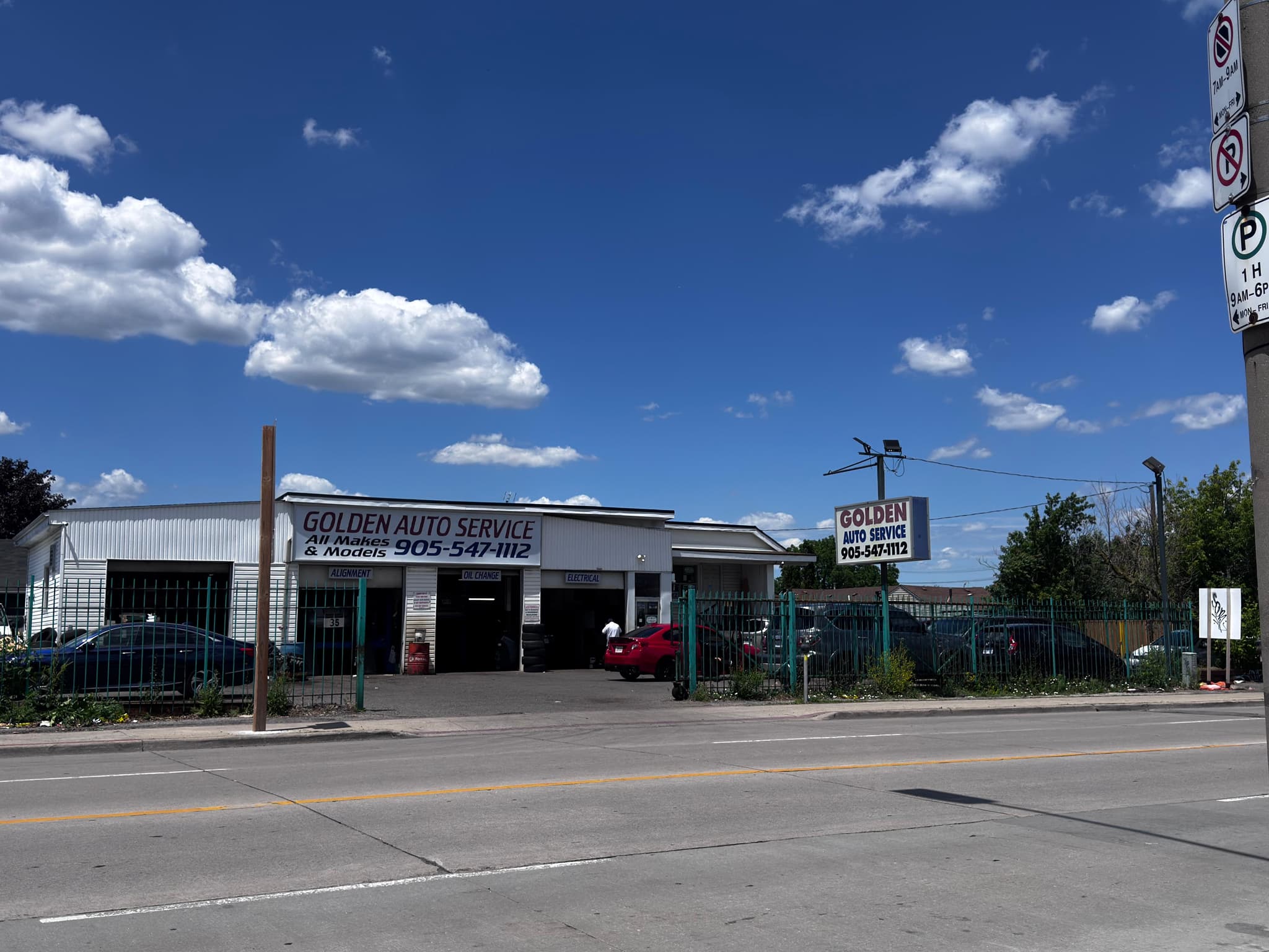 Exterior storefront view of Golden Auto Service repair shop facility in Hamilton