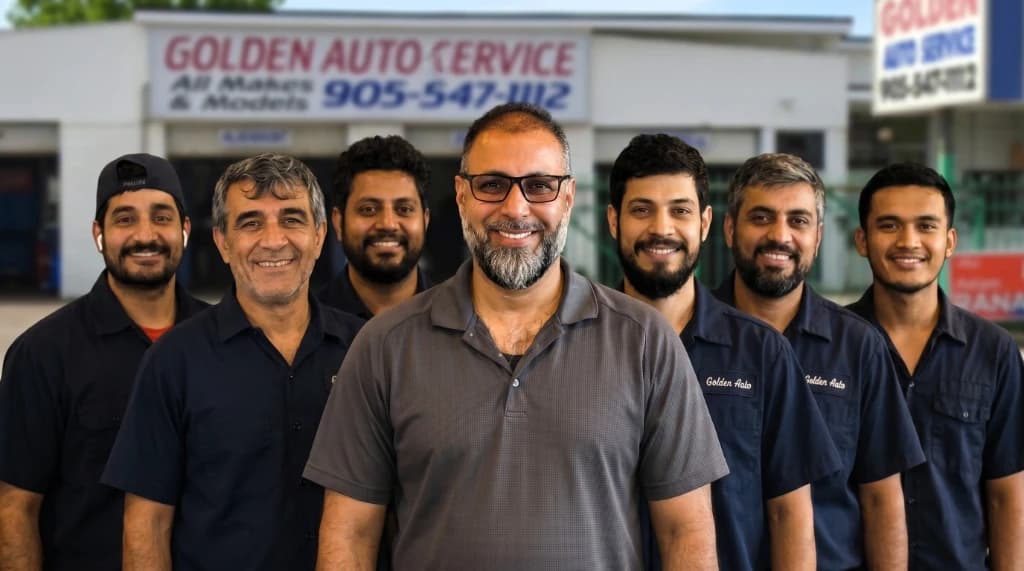 The Golden Auto Service Team standing in front of the Hamilton shop